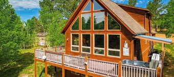 Family Cabin with looking up at back of Pikes Peak