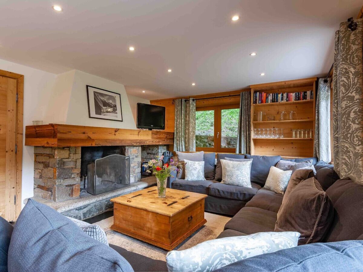 TV, fireplace, books, stereo