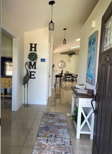 Short drive to the beach, or stay by the pool.