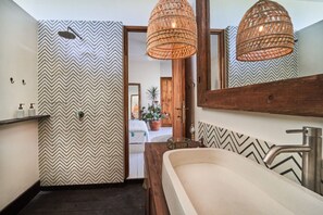 Bathtub, hair dryer, towels