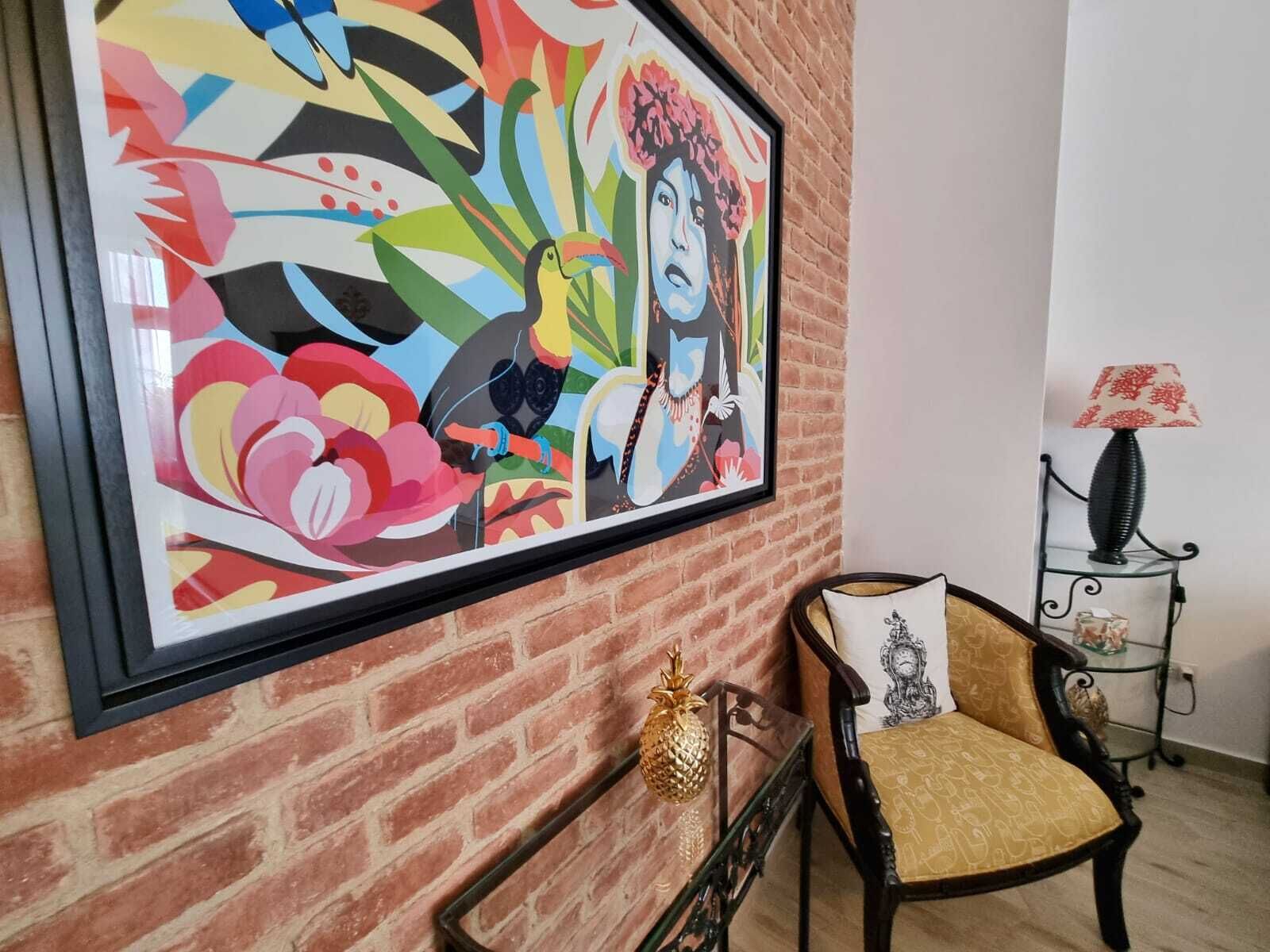 Colorful print showing off some of our Panamanian nature and an Embera woman.