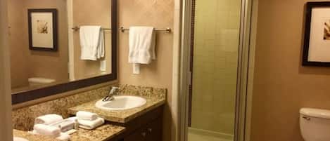 Shower, jetted bath, hair dryer, towels