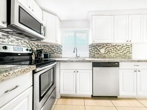 Apartment | Private kitchen | Full-size fridge, microwave, oven, stovetop - The oasis (Hollywood)