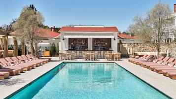 Outdoor pool, cabanas (surcharge), pool umbrellas