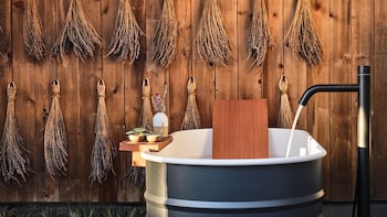 Outdoor spa tub at The Inn at Matteis Tavern, Auberge Collection