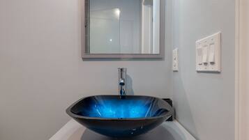 Shower, towels, soap, toilet paper