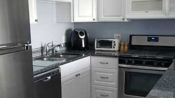 Panoramic Studio Suite, Beach View | Private kitchen | Oven, stovetop, dishwasher, toaster oven