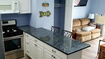 Panoramic Studio Suite, Beach View | Private kitchen | Oven, stovetop, dishwasher, toaster oven