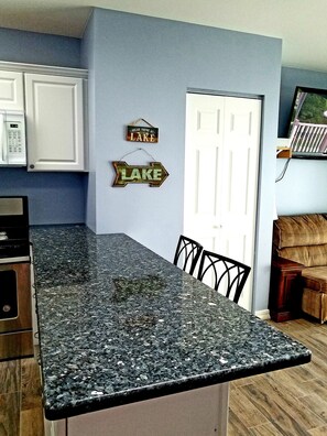 Panoramic Studio Suite, Beach View | Private kitchen | Oven, stovetop, dishwasher, toaster oven - LAKE HURON BEACH SUITE (Fort Gratiot)