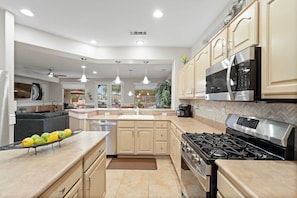Fridge, microwave, stovetop, dishwasher - Pool & Golf Cart: Sun City Grand Home! (Surprise)