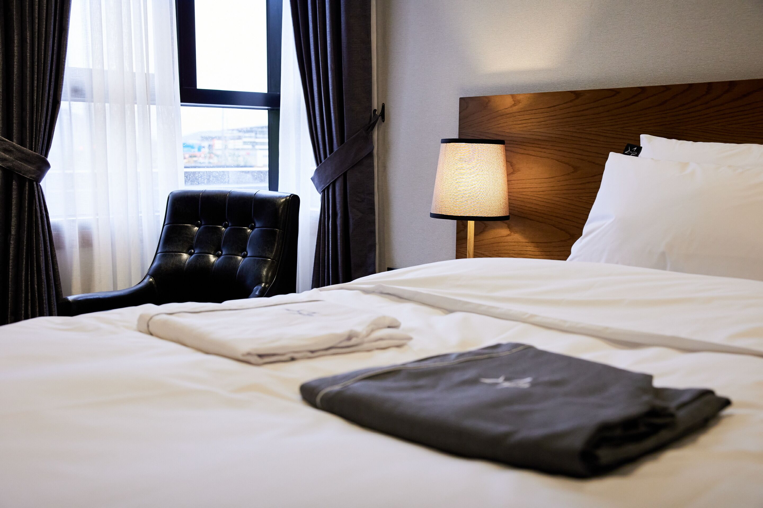 corner suite | 1 bedroom, in-room safe, blackout curtains, soundproofing