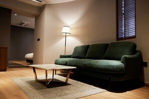 Suite, sudut | Area keluarga | TV layar datar