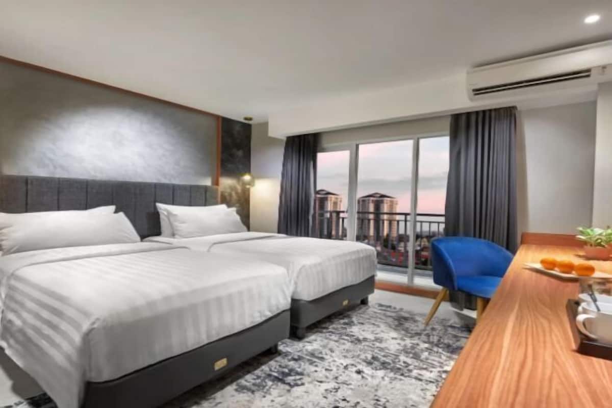 1 slaapkamer, een minibar, een kluis op de kamer, een bureau