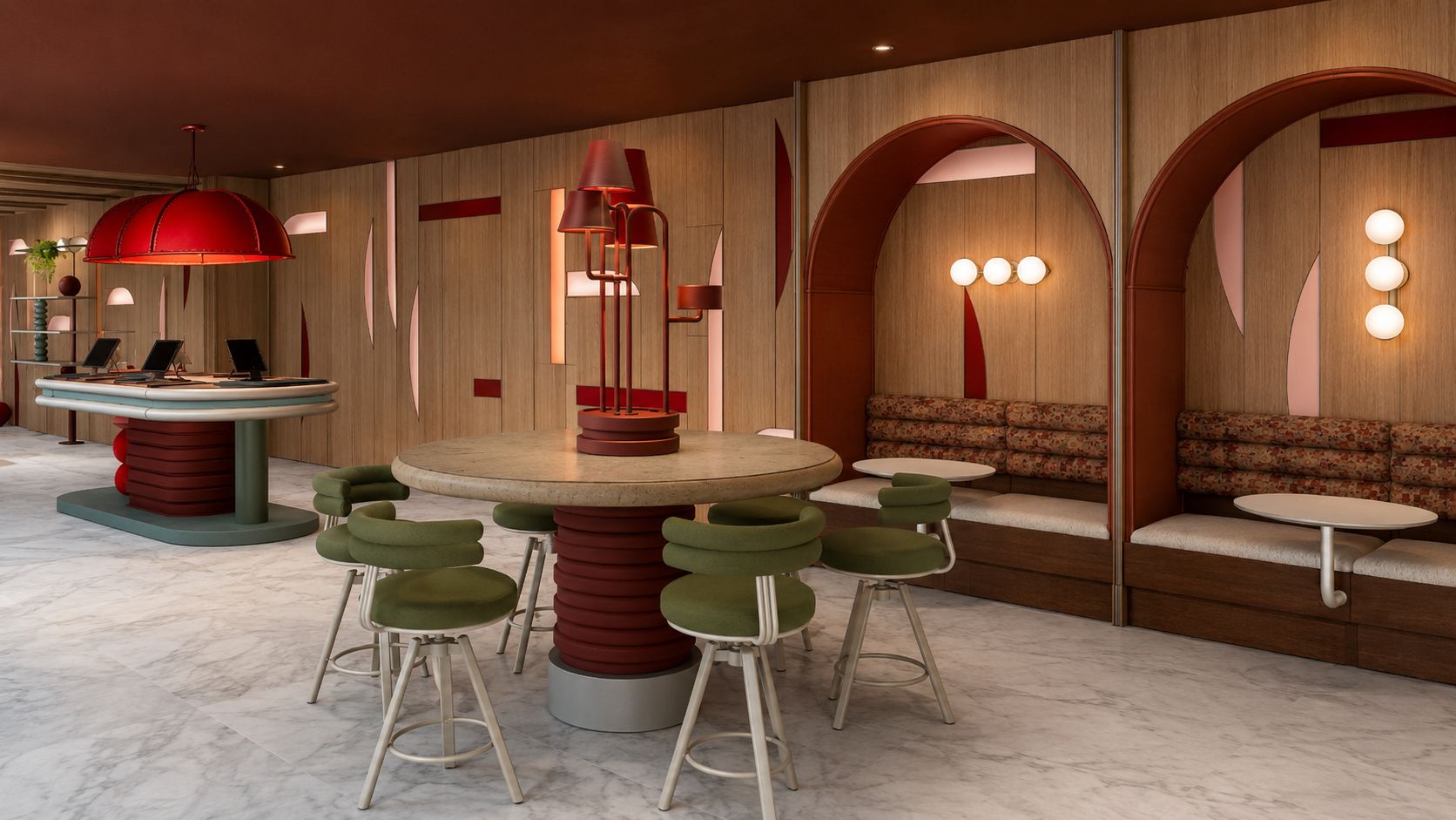 A modern interior with a round table surrounded by green bar stools, a red hanging light fixture, and a seating area with cushioned benches.