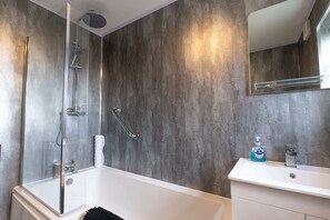 Bañera y secador de pelo