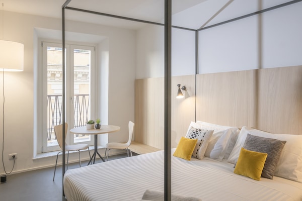 Executive Studio Suite, Terrace, Garden View | In-room safe, desk, blackout drapes, free WiFi