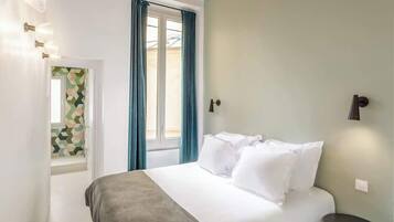 2 slaapkamers, een strijkplank/strijkijzer, reisbedje, gratis wifi