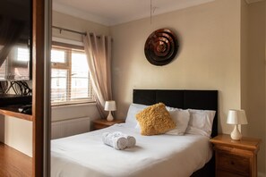 Casa | 4 habitaciones, tabla de planchar con plancha y wifi gratis 