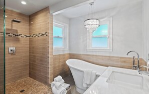 Bathtub, hair dryer, towels