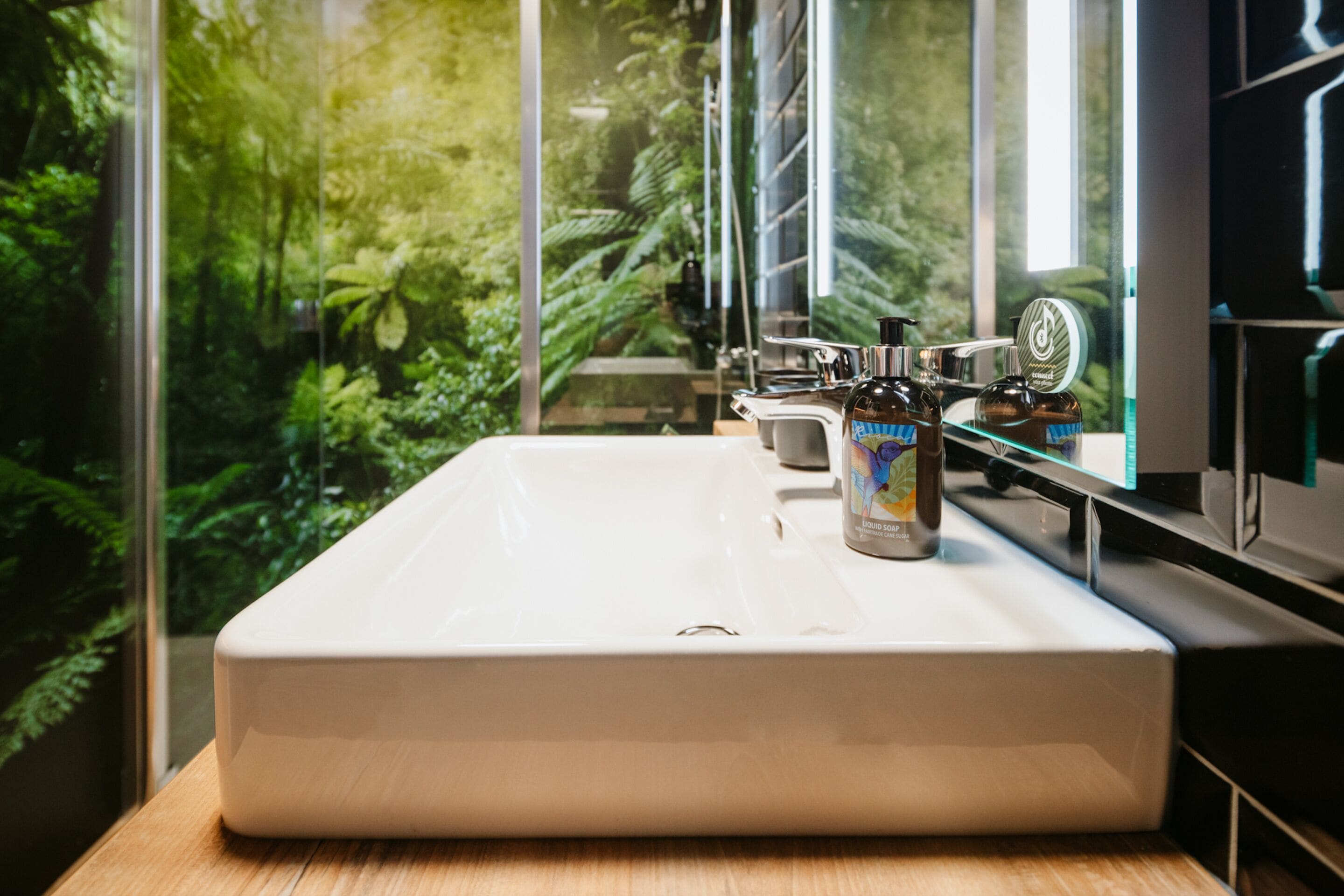 shower, rainfall showerhead, hair dryer, towels