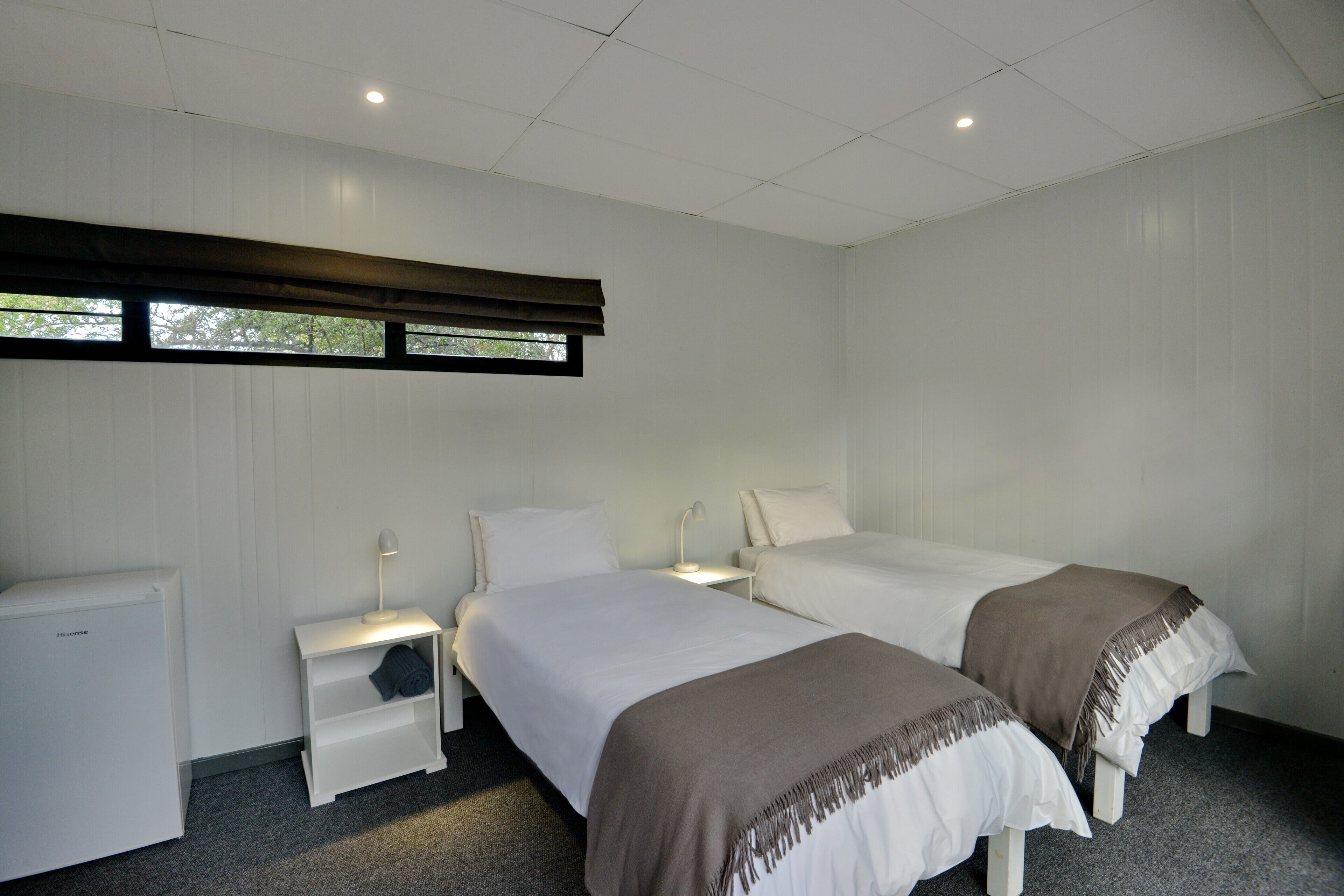Minibar, desk, bed sheets