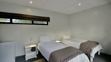 Minibar, desk, bed sheets