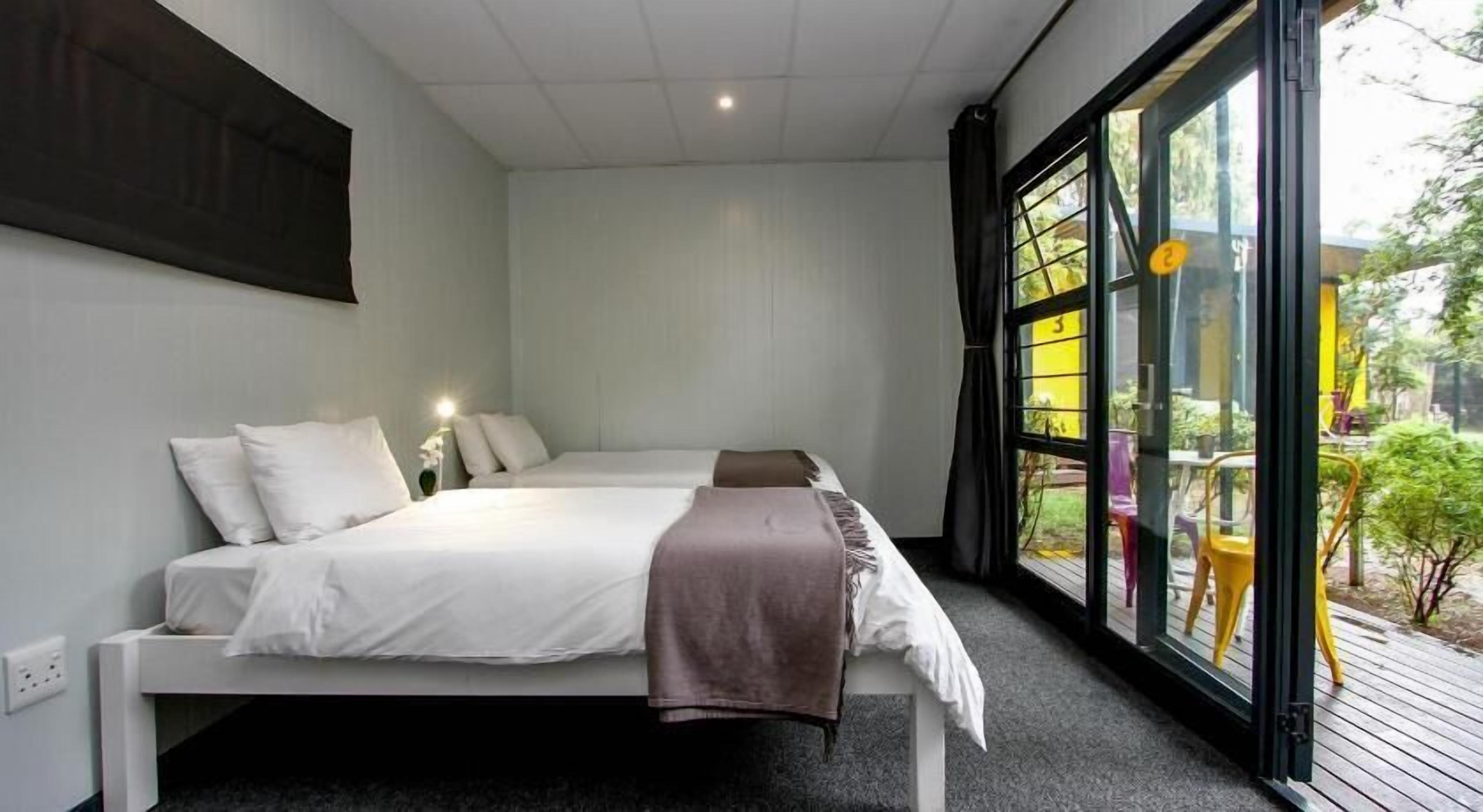 Minibar, desk, bed sheets