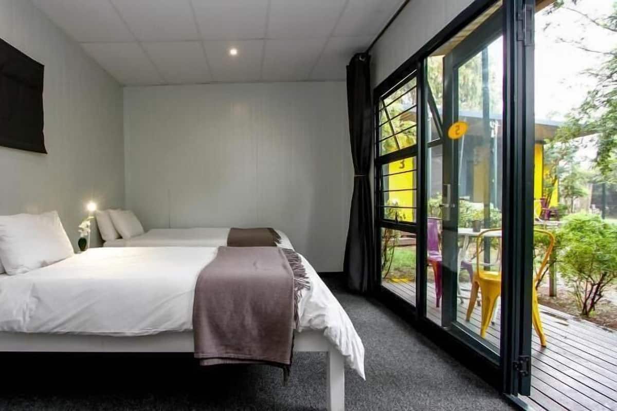 Minibar, desk, bed sheets