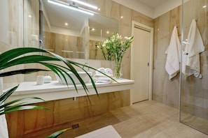 Bathtub, hair dryer, towels