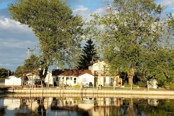 AuSable River view of Suites C,B,A.