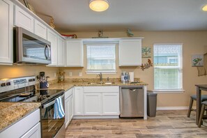 Réfrigérateur, four, plaque de cuisson, lave-vaisselle