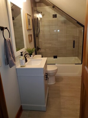 Hair dryer, towels, soap, shampoo