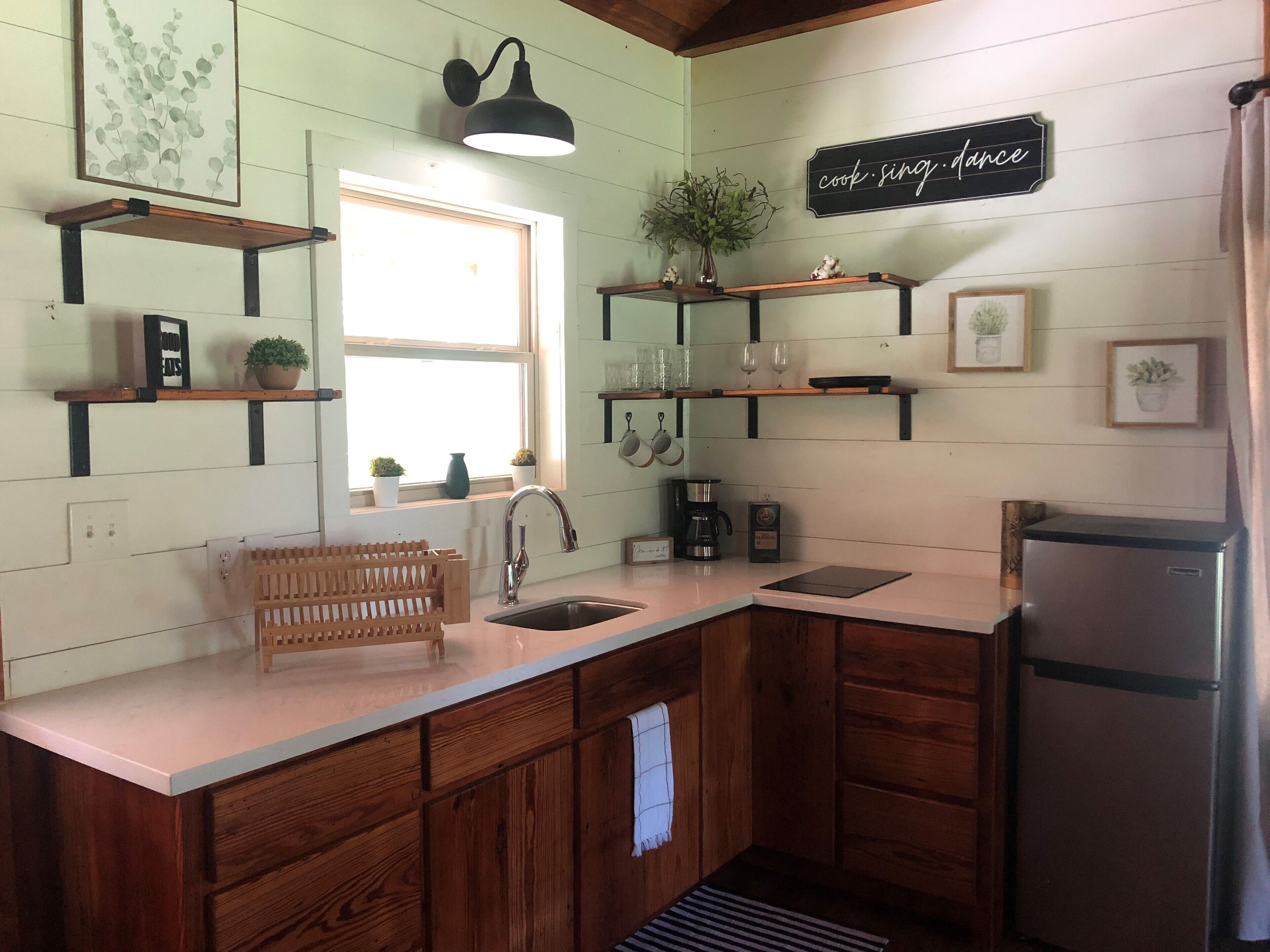 Fridge, microwave, stovetop, coffee/tea maker