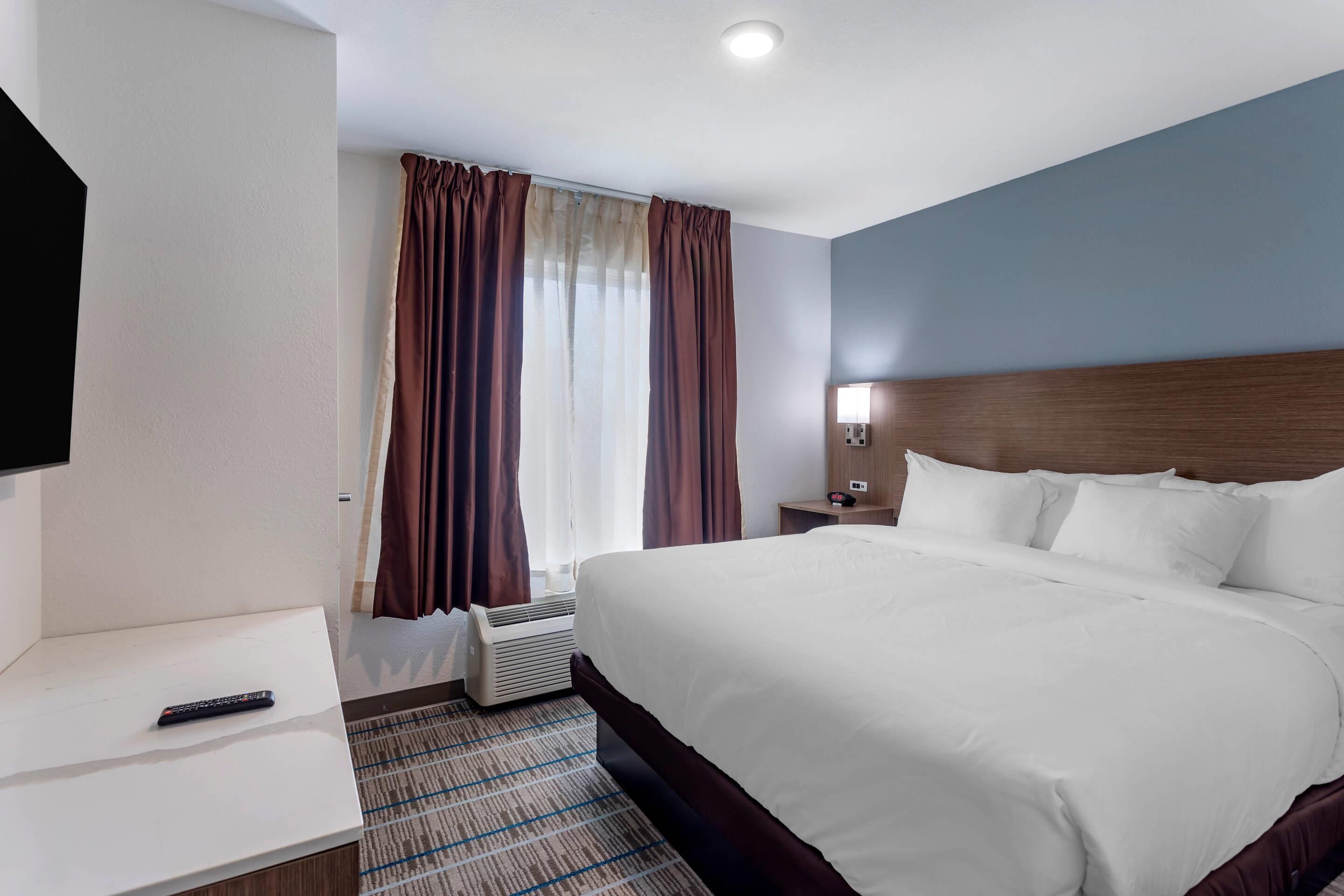 Pillow-top beds, desk, blackout curtains, iron/ironing board