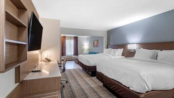 Pillowtop beds, desk, blackout drapes, iron/ironing board