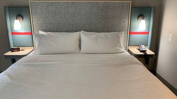 Desk, laptop workspace, blackout drapes, iron/ironing board