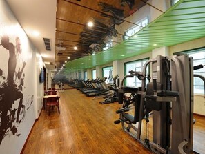 Stay active with our fully equipped gym featuring treadmills, weight machines, and free weights.