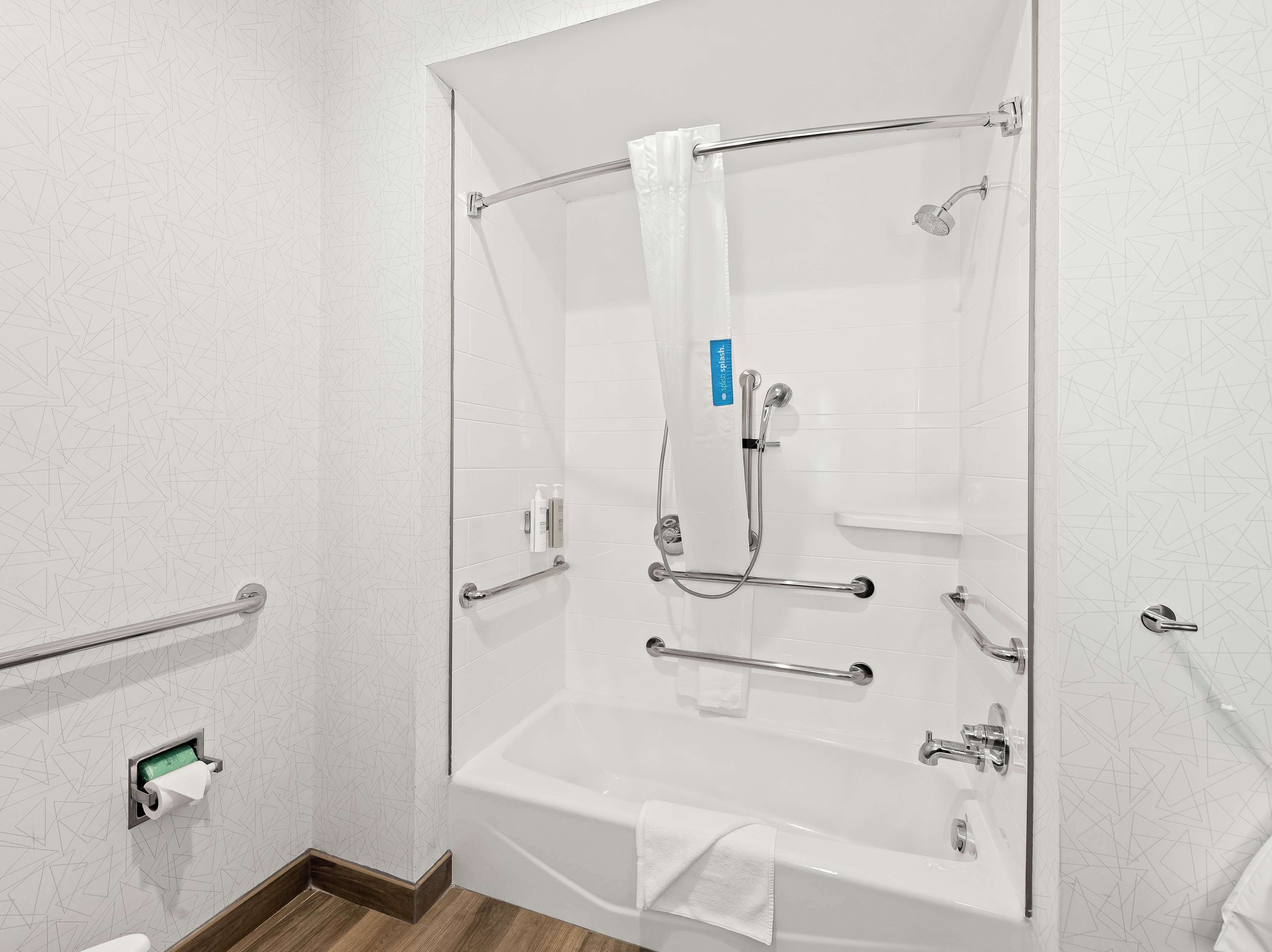 hydromassage showerhead, hair dryer, towels, soap