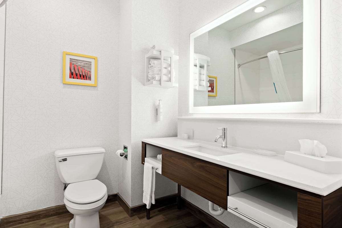 hydromassage showerhead, hair dryer, towels, soap