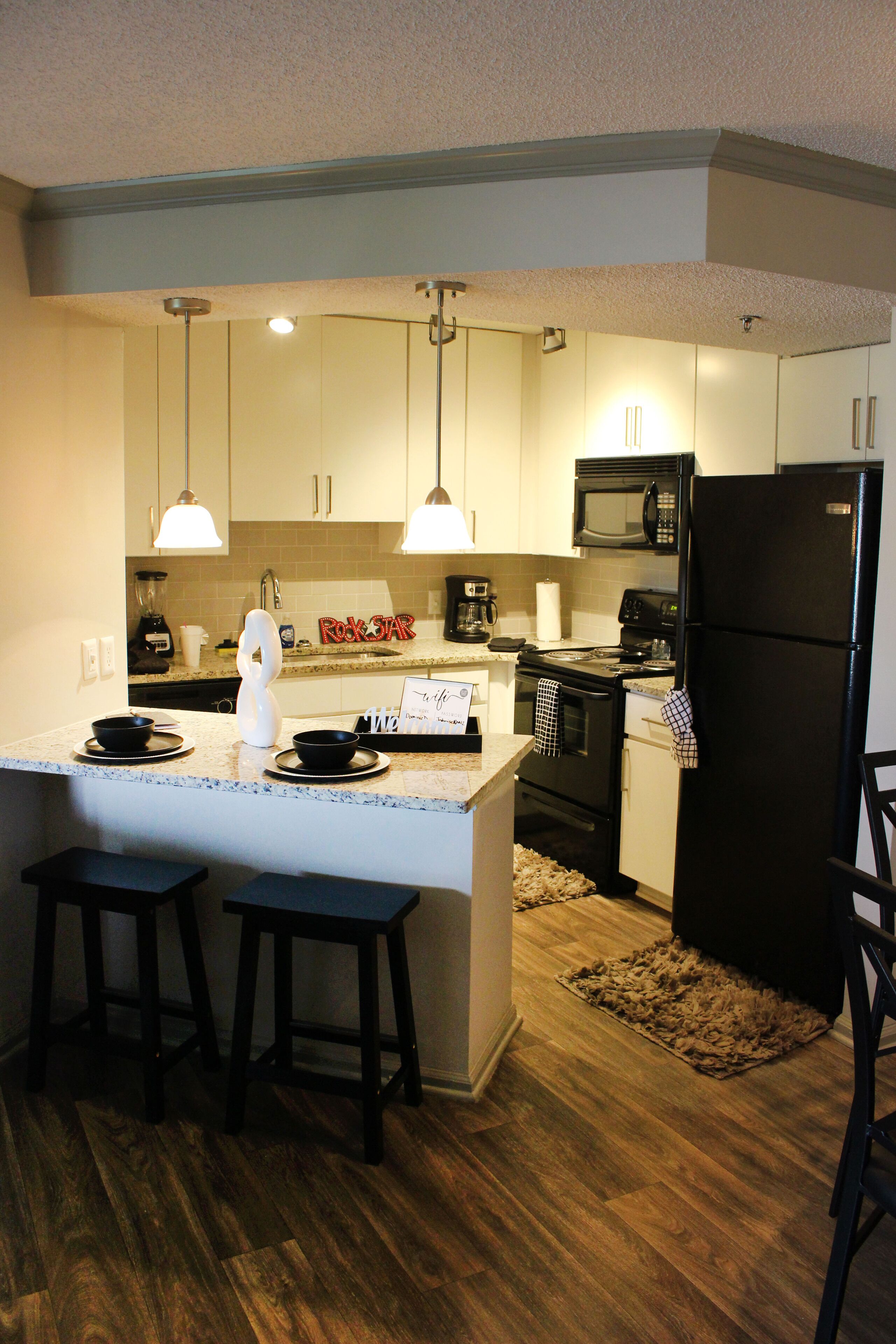 Coffee/tea maker, fridge, microwave, oven