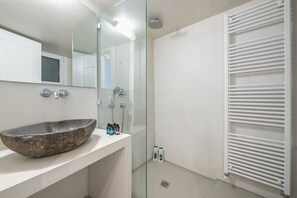 Hair dryer, towels, soap, shampoo