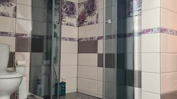 Shower, rainfall showerhead, towels