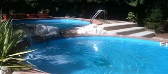 Holiday home with pool and air conditioning