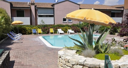 Appartement de vacances avec balcon et piscine