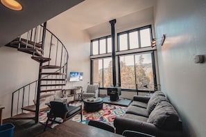 Deluxe Condo, 2 Bedrooms, Pool Access, Lake View (Decatur 1804) | Living area | 42-inch flat-screen TV with cable channels, TV, fireplace - Decatur 1804 (Keystone)