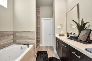 Combined shower/bathtub, towels, soap, shampoo