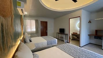 Hypo-allergenic bedding, down comforters, minibar, in-room safe