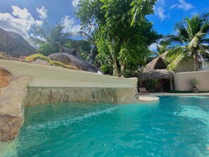 Outdoor pool, open 8:00 AM to 9:00 PM, pool umbrellas, sun loungers