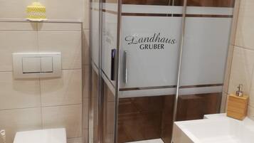 Shower, free toiletries, hair dryer, towels