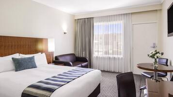 Egyptian cotton sheets, premium bedding, minibar, in-room safe